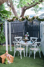 Load image into Gallery viewer, My Little Manor Cubby House Pergola decroated for Easter in garden
