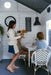kids playing cafe inside My Little Manor playhouse