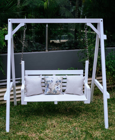 White timber Hamptons style swing bench seat for kids.